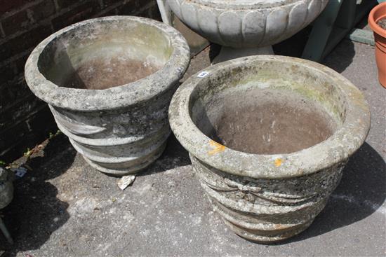 Small pair composition stone urns